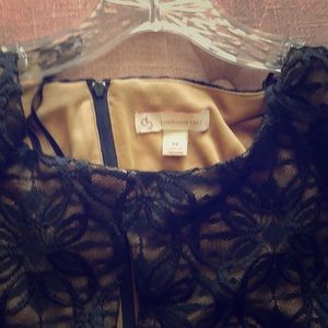 Sleeveless black lace dress